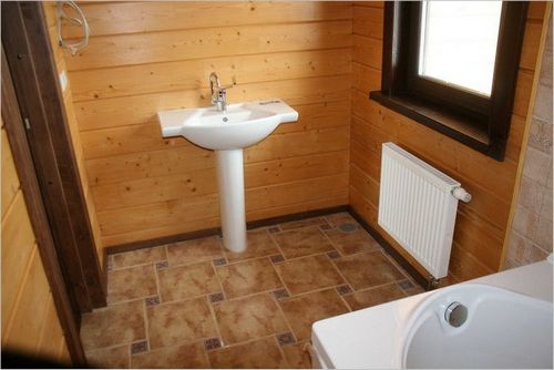 Укладка плитки на деревянный пол в ванной