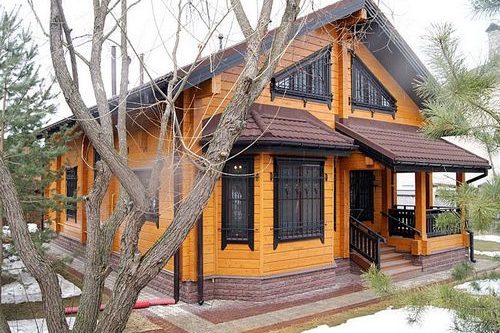 Срубы домов из бруса: (7 фото), обычный брус, профилированный